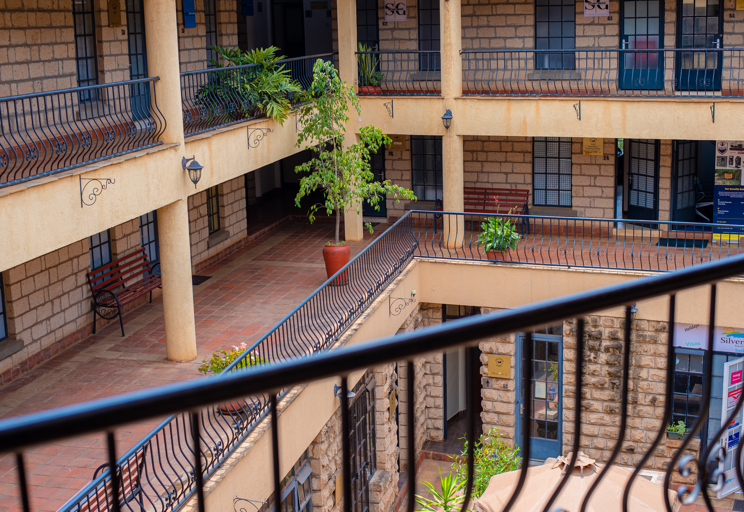 Tranquil courtyard view with water feature and seating